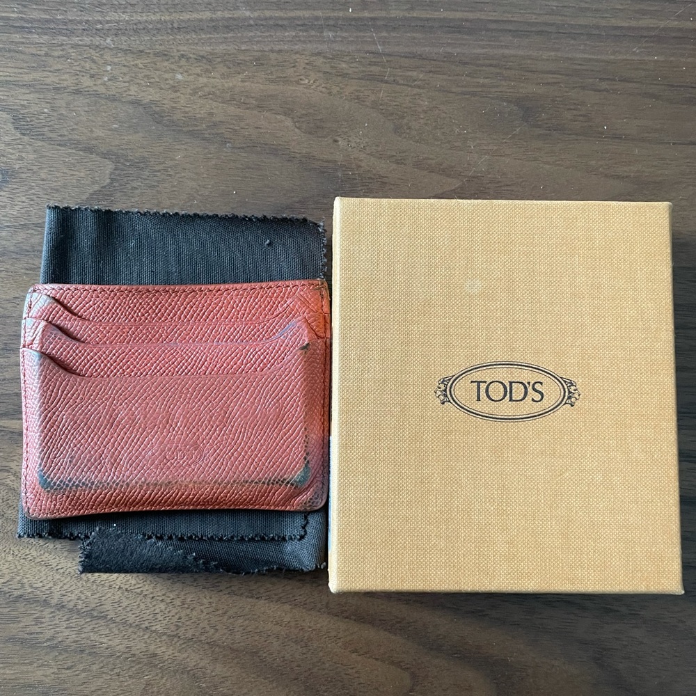 Tods orange card case in leather